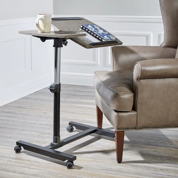 The Adjustable Height Reading Table with Tilting Surface: